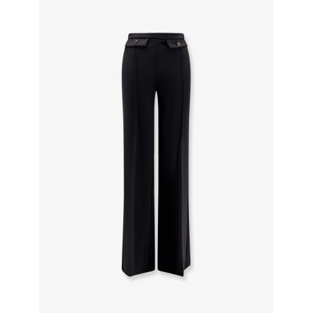 Trousers with double logoed button