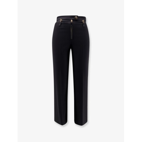 Trousers with logoed button