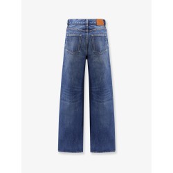 Jeans with leather logo tag