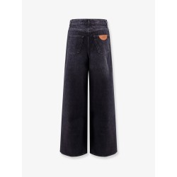 Jeans with iconic leather logo tag