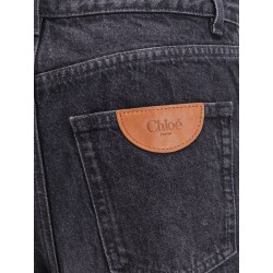 Jeans with iconic leather logo tag