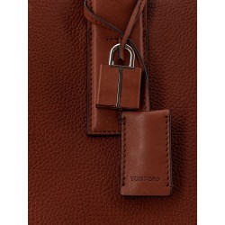 Hammered leather handbag with engraved logo on the front