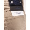 Denim trousers with logo patch on the back