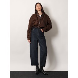 Twisted dark blue denim jeans