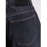 Twisted dark blue denim jeans
