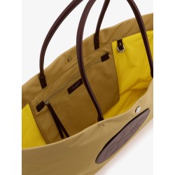 Ella Twist nylon shoulder bag with maxi logo patch on the front