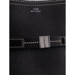 Hammered leather bucket bag with strap on the front