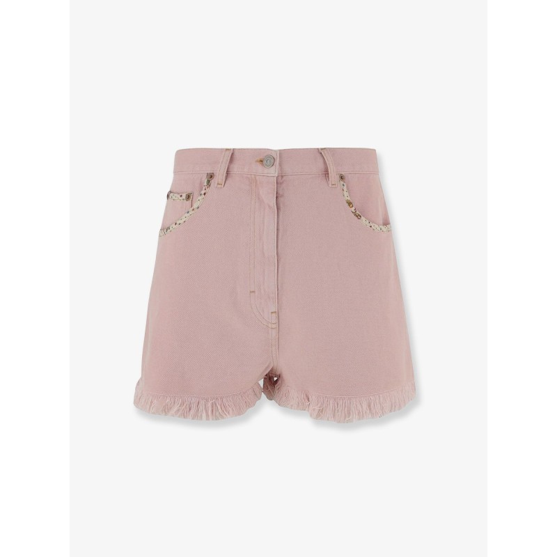 Denim shorts with frayed edges