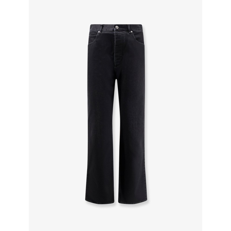 Black denim trousers with back leather patch