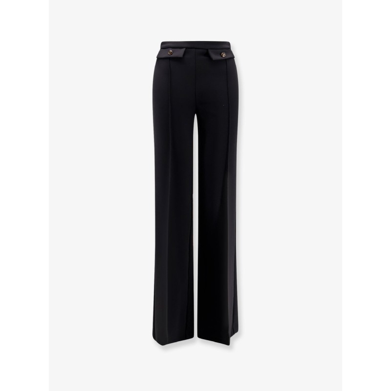 Trousers with double logoed button