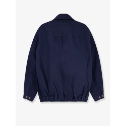 Blue denim jacket with embroidered logo on the front