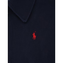 Blue denim jacket with embroidered logo on the front