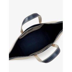 Canvas travel bag with leather profiles