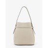 Hammered leather bucket bag with strap on the front